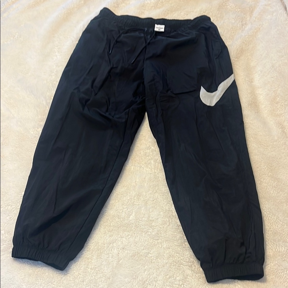 Nike Black Track Pants with Relaxed Fit and Elastic Cuffs